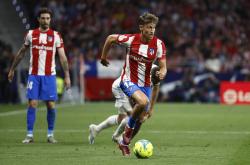 爱游戏官网网页版入口-关于马德里竞技战平莱比锡，双方携手晋级的信息