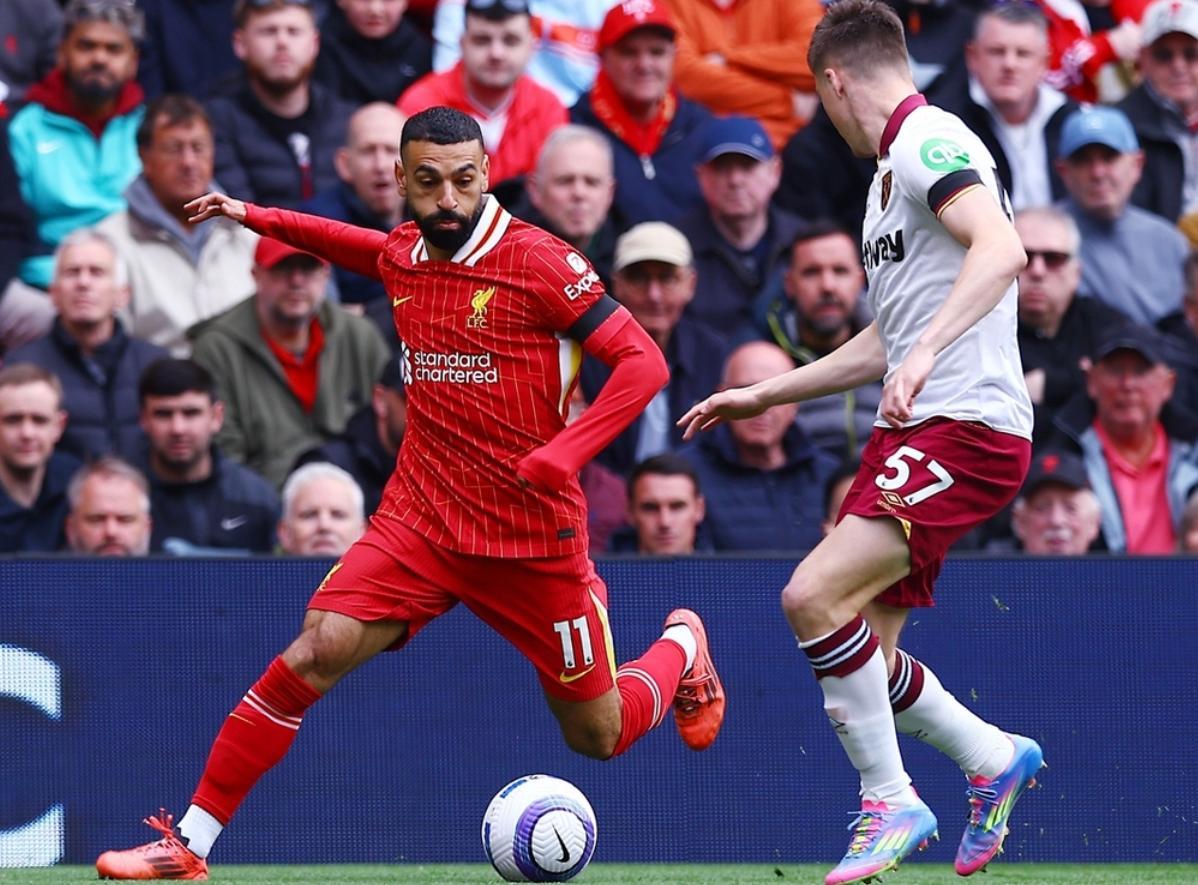 利物浦客场逆转，锁定小组第一